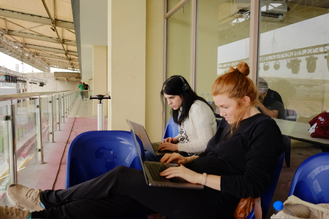 Working session on laptops at the stadium