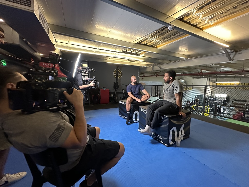 Two-camera interview set-up filming the Troy Denney pilot episode in the gym