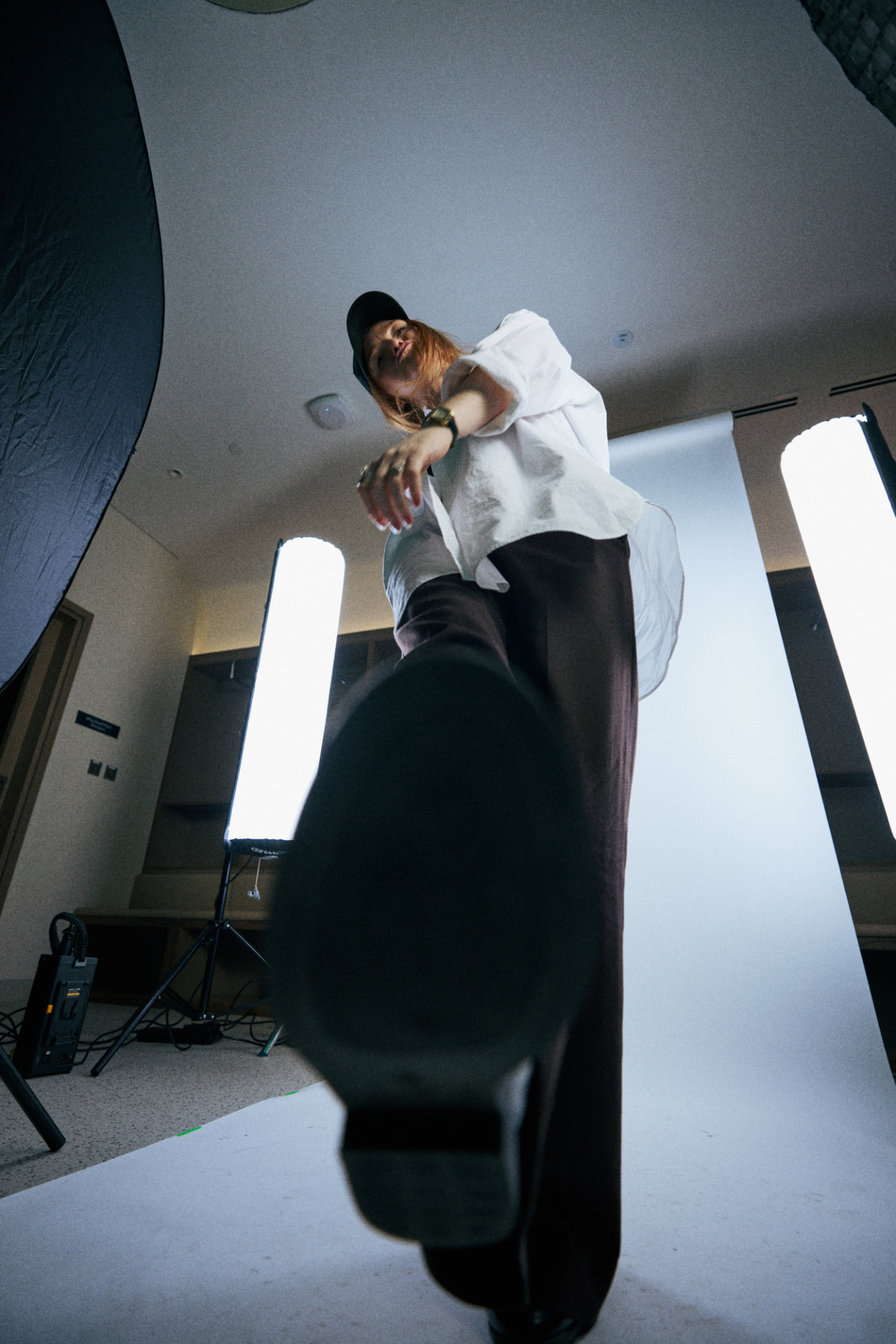 Kristen mid-motion on a studio shoot
